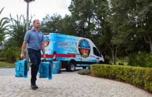 United Water Restoration Group arriving at a property in a service van